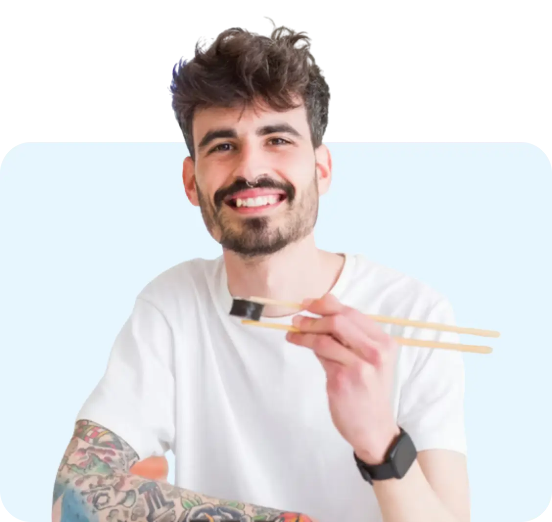 man eating sushi